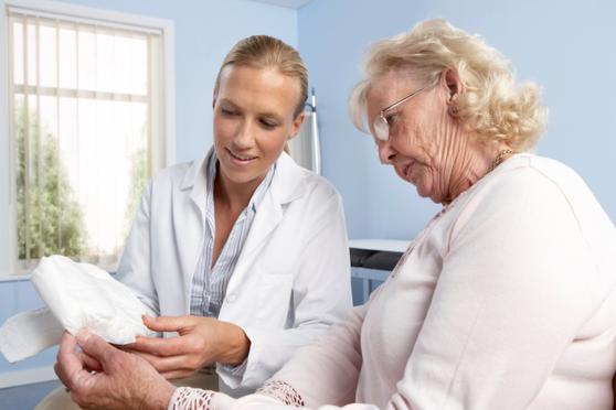 doctor speaking to patient