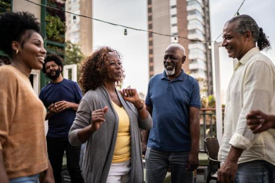 Woman dancing with friends